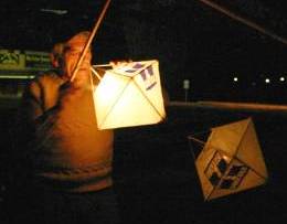 Lantern Maker, Graeme Dunstan, lighting his lanterns on the morning of December 3