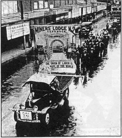 Cessnock May Day, 1936 - Cessnock Minors Lodge No 1 banner showing the temple form of banner symbolism