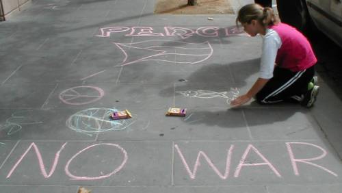 Anti-war slogans on footpath